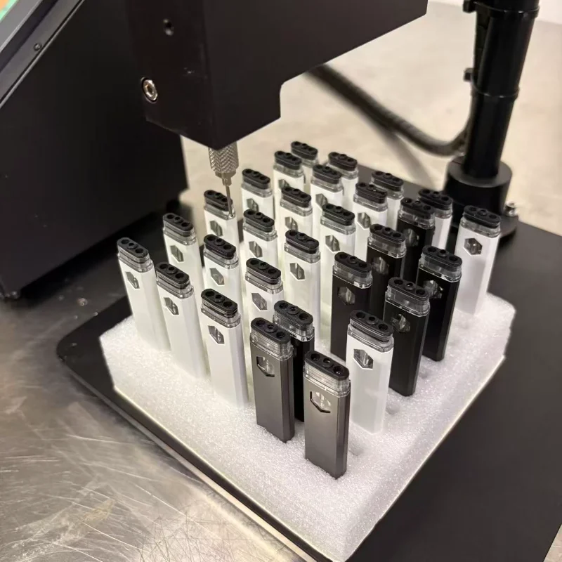 Syringe filling machines for vape oil and herbal extracts